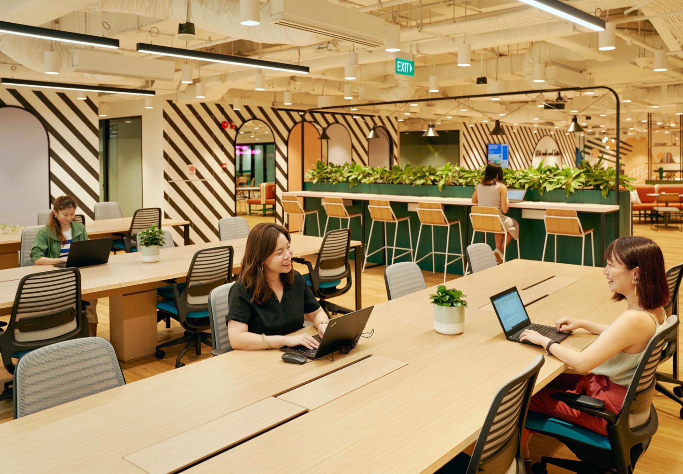 People collaborating in a shared workspace